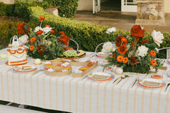 Table Setting with cookies, cake and decor in KS Chiefs and Taylor Swift theme