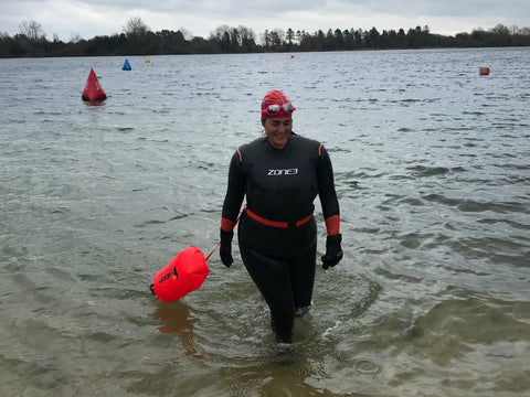 Open water swimmer in wetsuit at lake 32