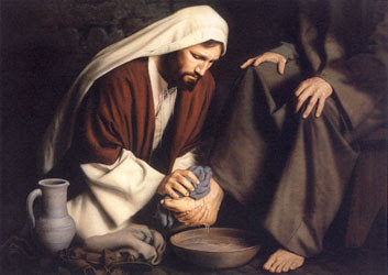 Jesus washing the disciples feet.