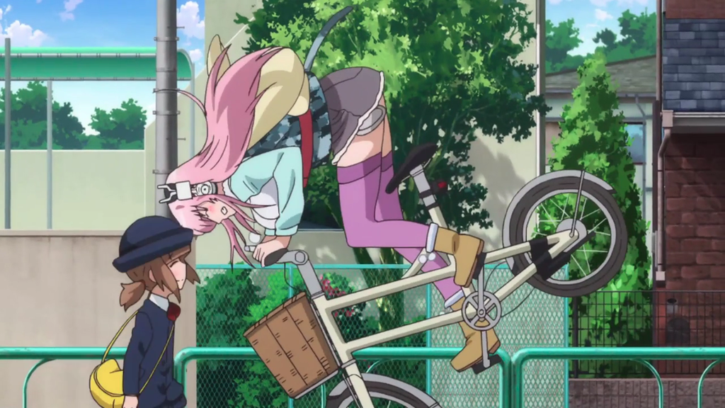 Super Sonico's booty is in the air as she almost falls from her bicycle