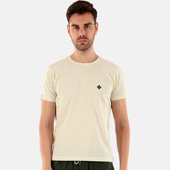 man in cream colored t-shirt