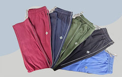 picture of many trackpants in red, blue, green, black and light blue color