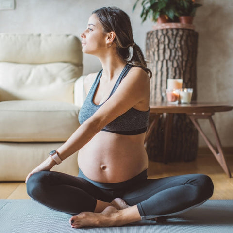 Mother doing exercise at home