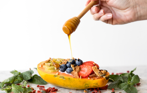 Drizzle honey over fruit