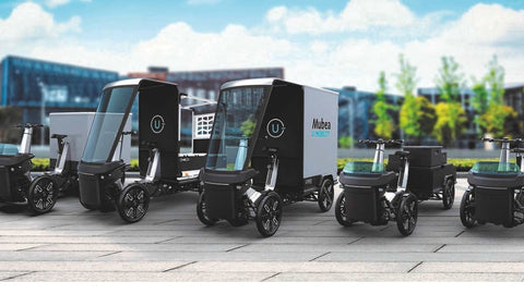 Mubea fleet of four wheel EV cargo vehicles for businesses.