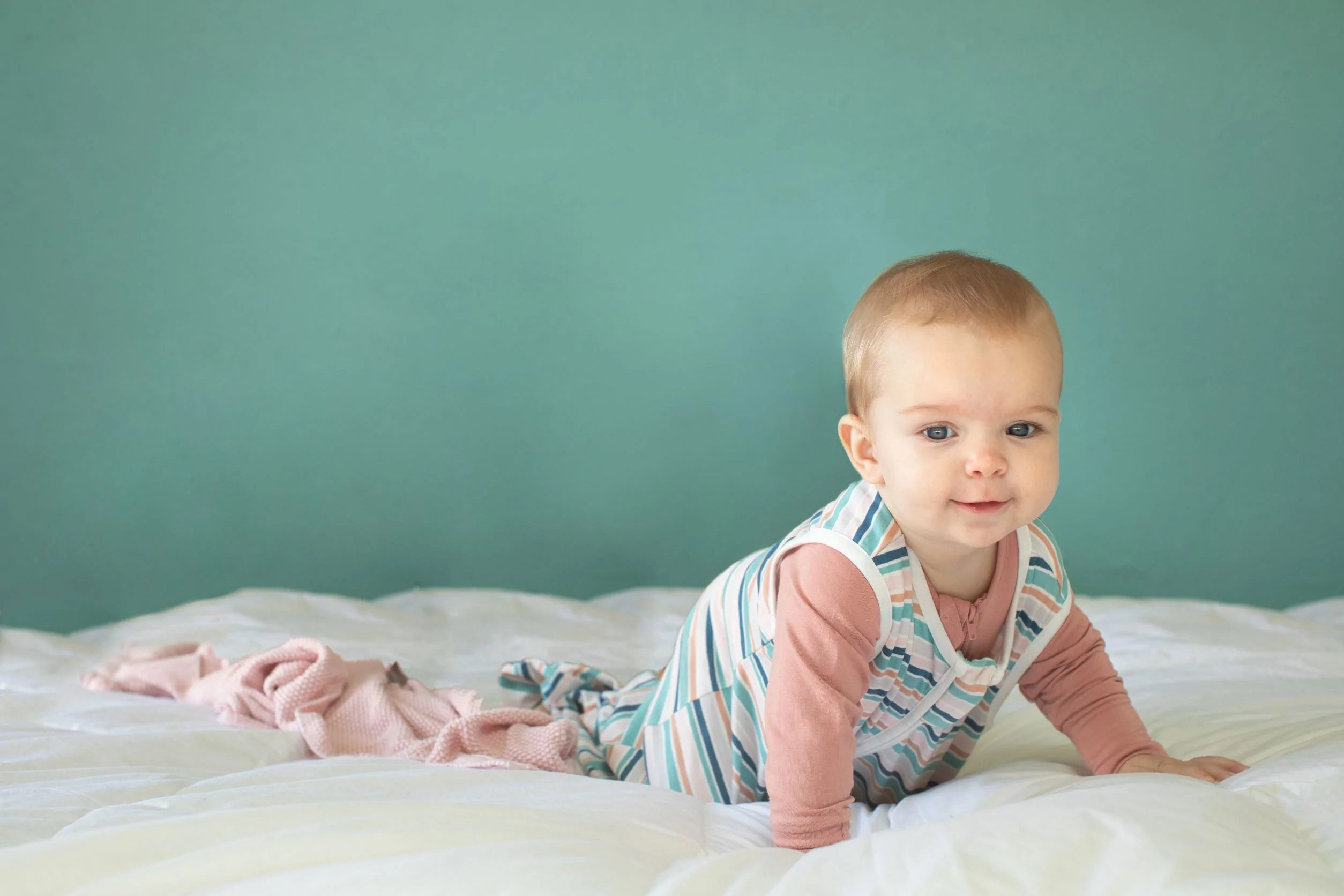 Baby wearing an organic sleeping bag