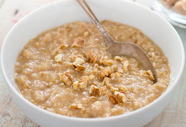 Bowl of oatmeal with a spoon in it