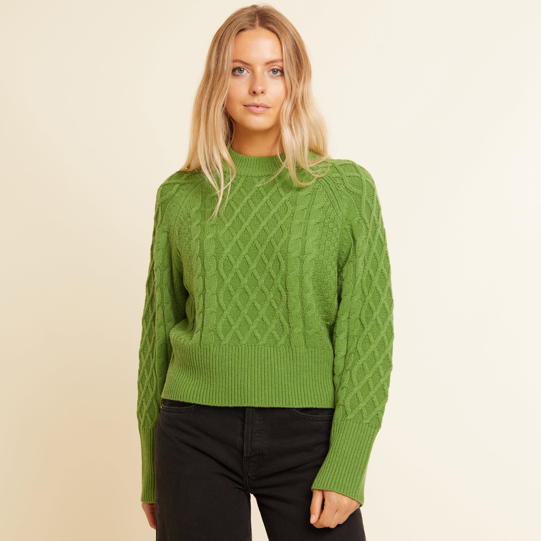 green knit jumper