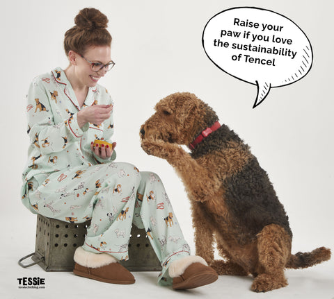 Poppy the airedale terrier with model in the Poppy Dog Print Pyjamas set