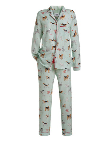 Tessie Clothing Poppy Dog Print Pyjamas Set | Pyjama print features airedale terriers, Dalmatians, west highland terriers and beagles in an illustrative style on a soft green background.