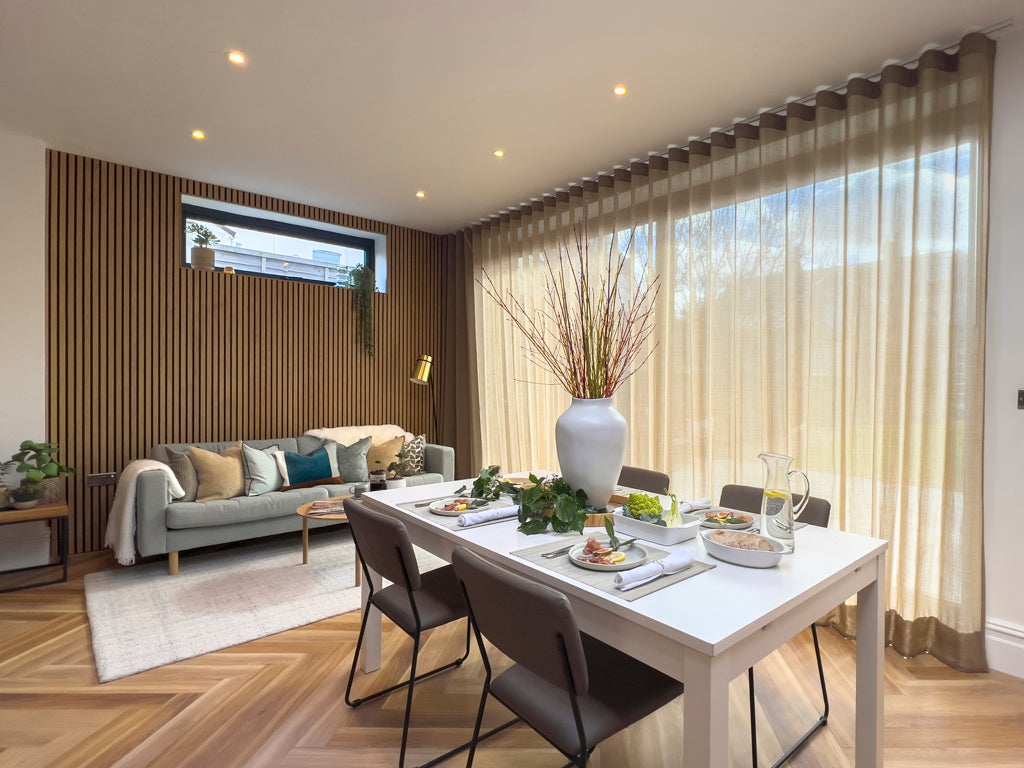 Dining room with sheer curtains from Kobe interiors fabrics