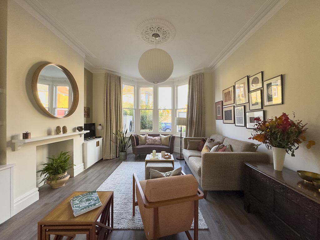 Warm and earthy living room in Victorian renovation