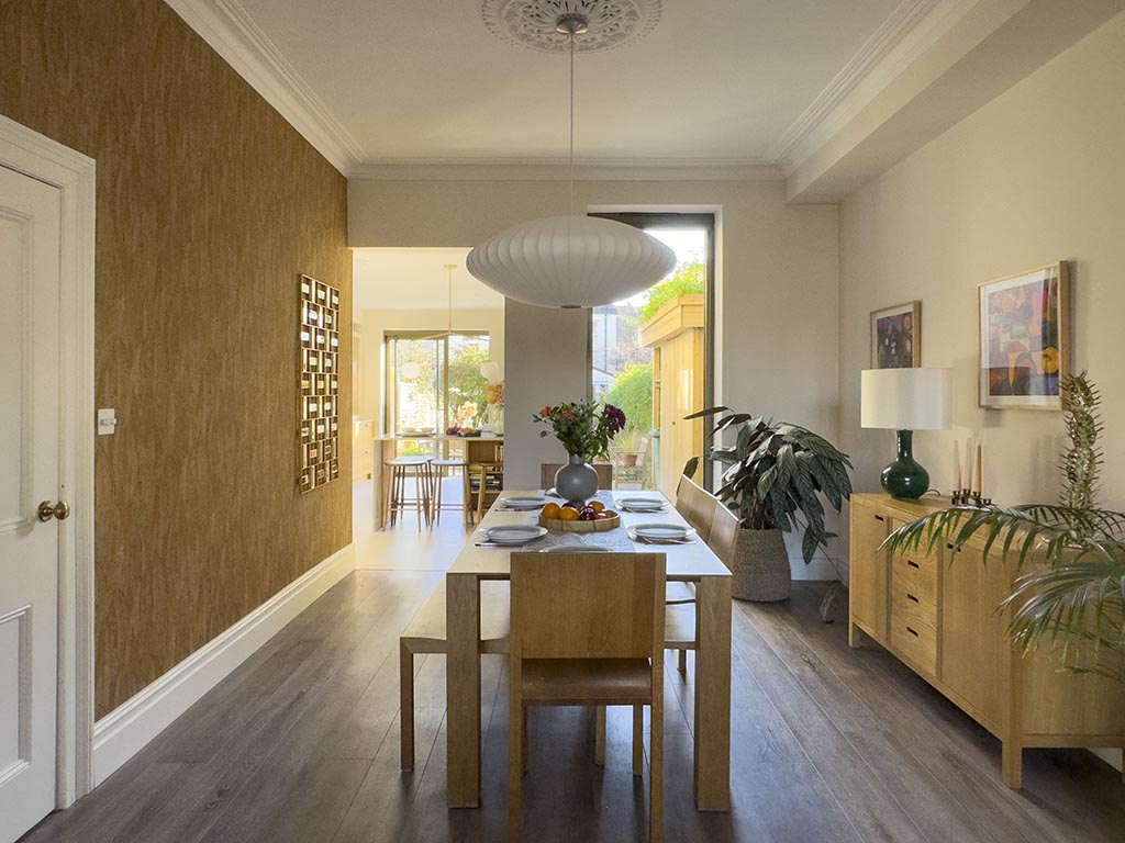 Dining room with feature wallpaper in Victorian renovation