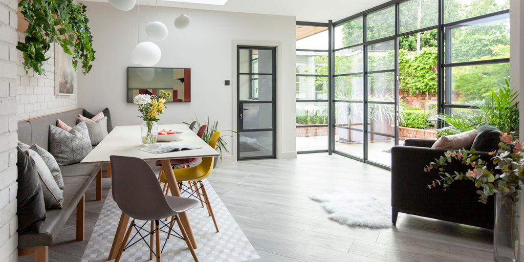 Open plan dining room with crittall style doors