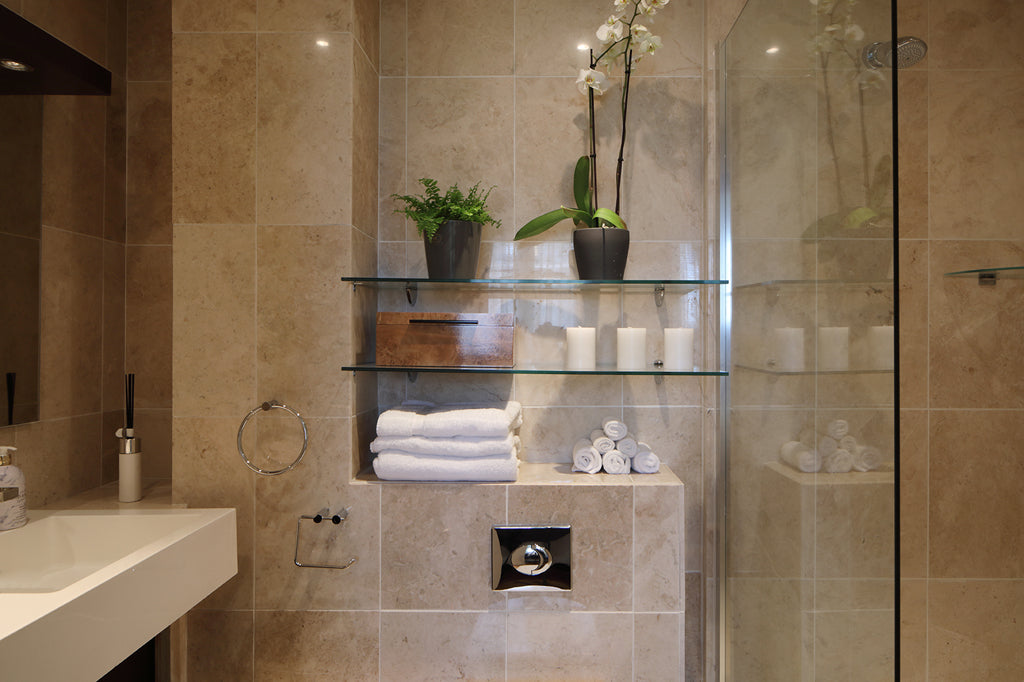 En-suite bathroom with marble tiles