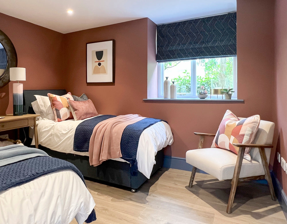 Colourful guest bedroom with twin beds 