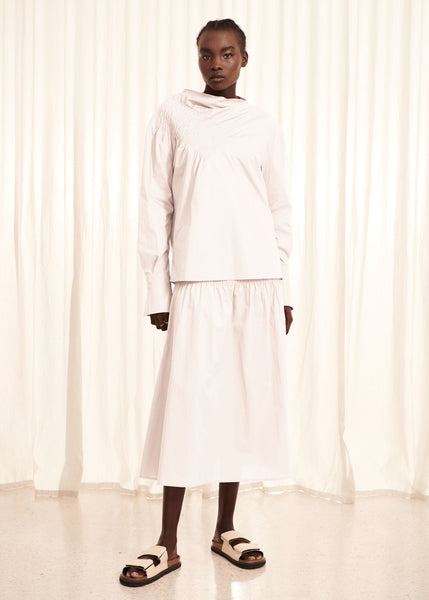 Nylow wears the Faith Shirred Top and Faith Shirred Skirt in White, available end February.