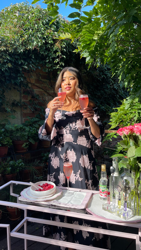 Jessica Nguyen wears the Rose Fragment Maxi Dress