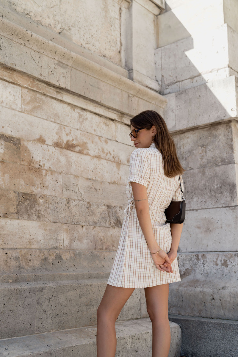 Ash Grats wears the Dylan Drawcord Dress.