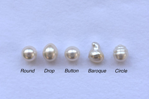 Collection of pearls showcasing a range of sizes and shapes, each unique in its beauty.