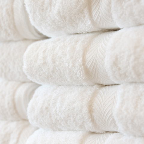 clean and fresh white towels washed with simple living eco detergent sheets