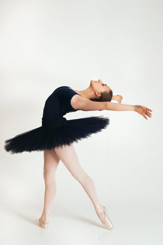 Dancer stretching back