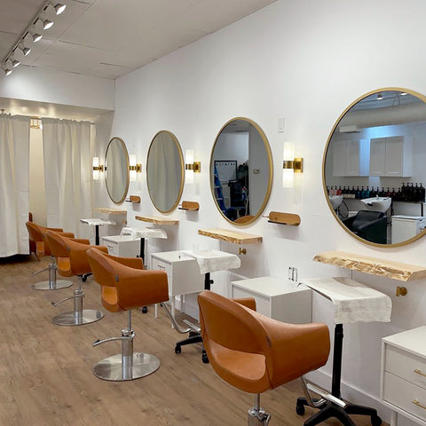 orange salon chairs in salon 