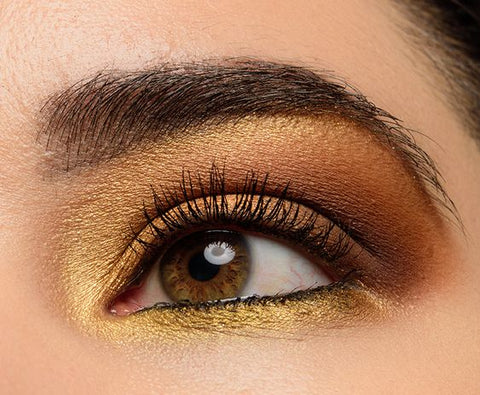 Glistening gold matched with bronze shades eyeshadow