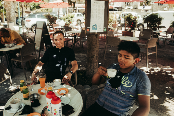 cyclists in a cofe drinking coffee