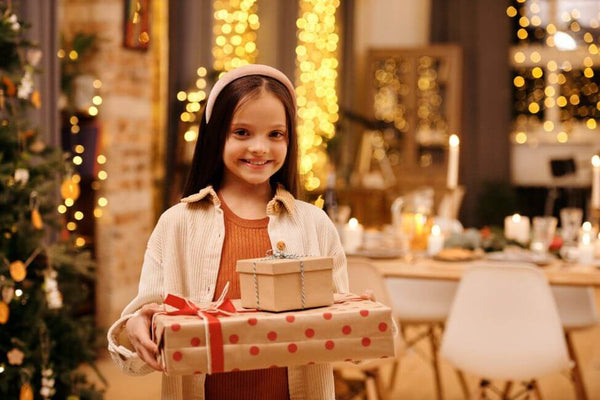 image of young girl with gift