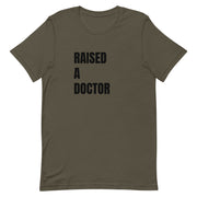 RAISED A DOCTOR-Short-Sleeve Unisex T-Shirt - Twice As Hard
