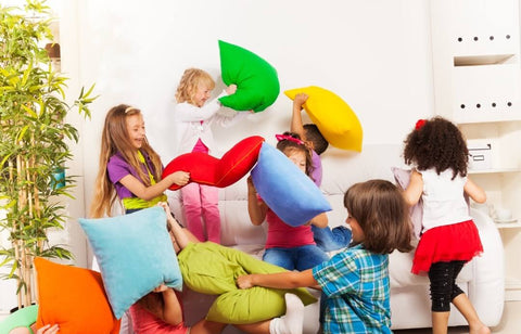 Children Playing Pillow Fight