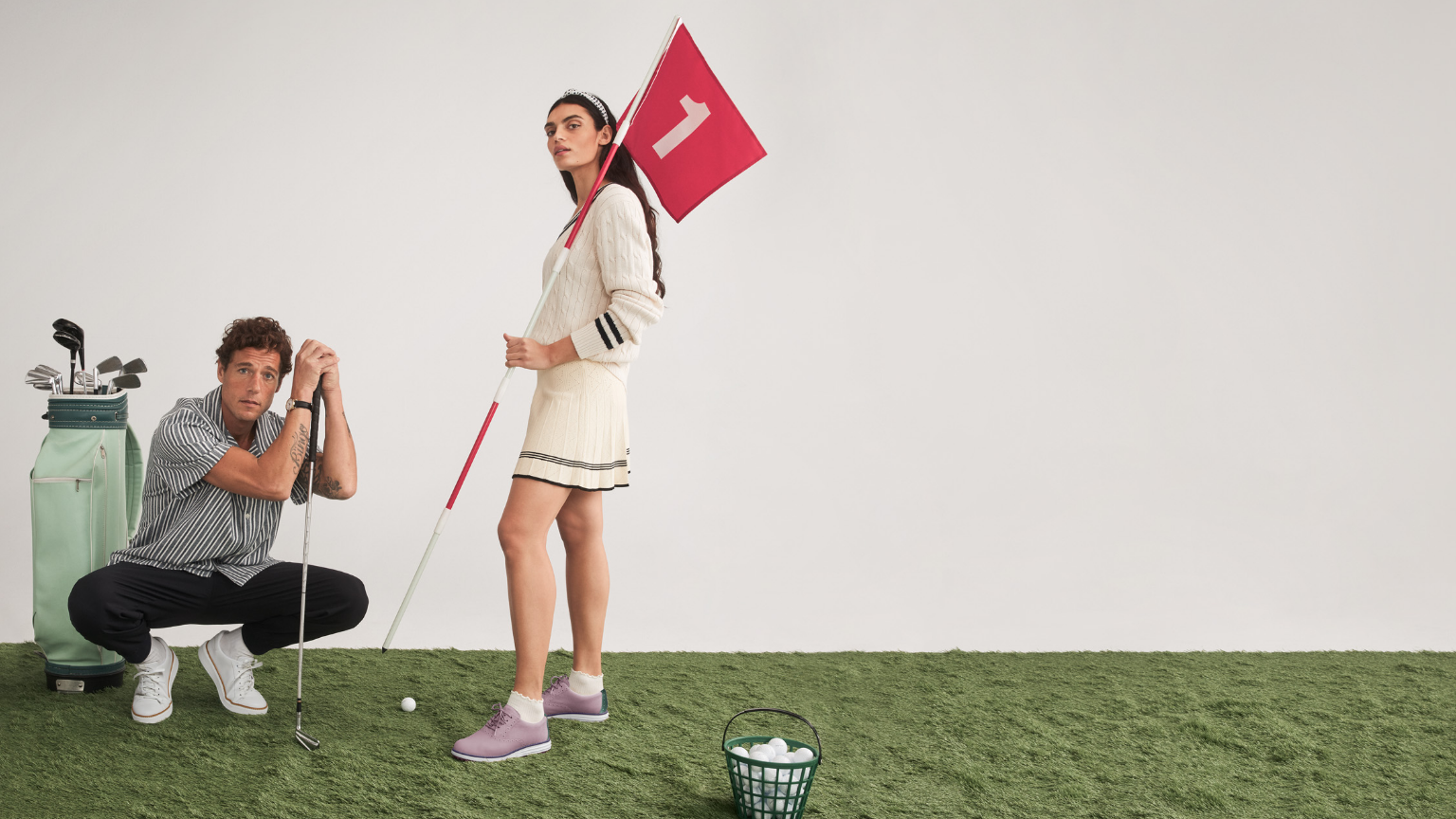Man and woman golfing