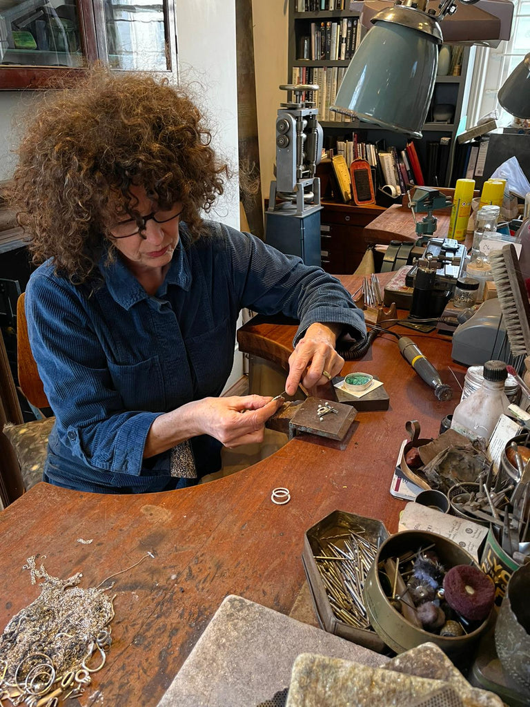 Catherine Hills Jeweller at her workbench