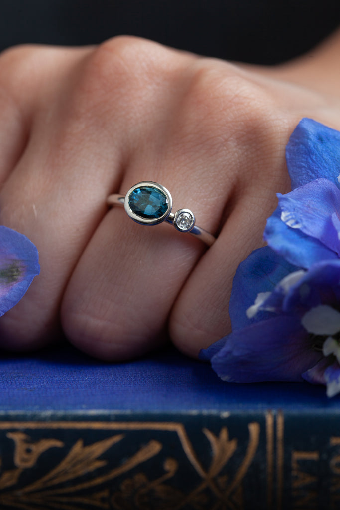 Catherine Hills Jewellery - Bespoke Couplet Engagement Ring with a diamond and blue sapphire