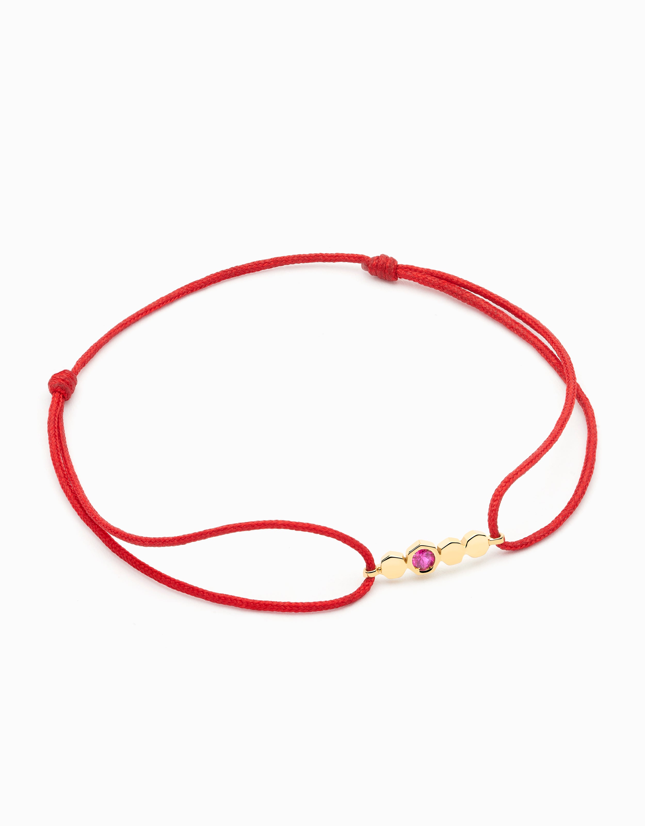 Pulsera solidaria Oncolliga con rubí y oro amarillo de 18k