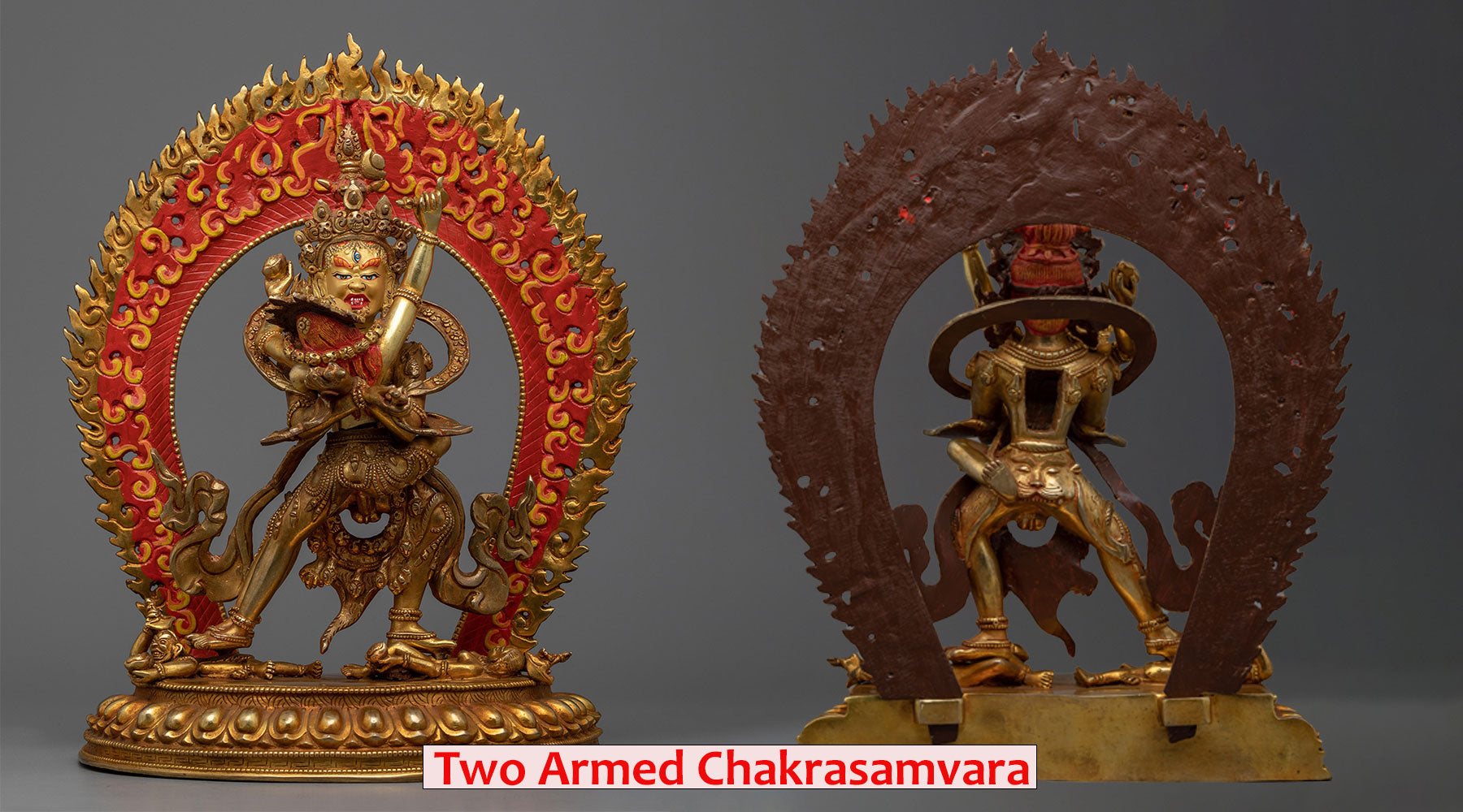 two armed chakrasamvara gold statue with consort