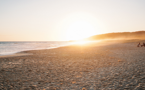 Sun sining bright on beach