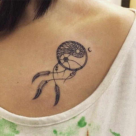 Tatouage Attrape-rêve Petit capteur de rêve discret yin yan avec figure lune et perle