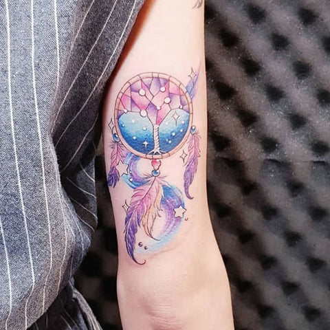 Tatouage Attrape-rêve bras arbre de vie étoile et perle multicolore