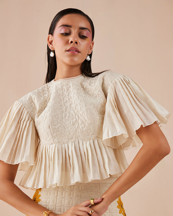 IVORY QUILTED AND PLEATED TOP