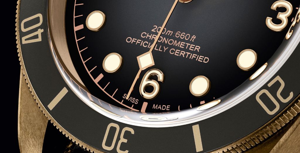 Close up of COSC dial markings on a Tudor Black Bay Heritage 