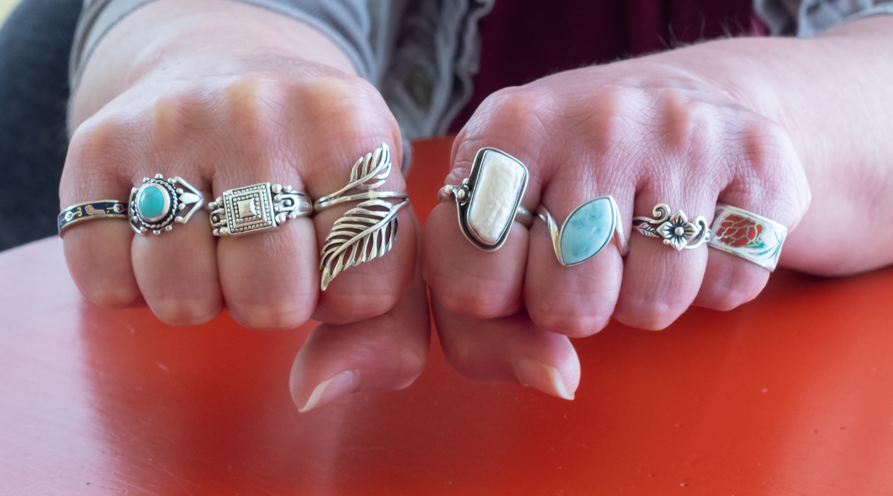 Close-up of rings on all fingers