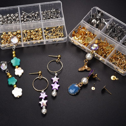 A tranquil jewelry crafting setup with various tools and beads