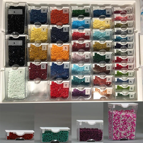 A variety of beads organized in labeled tubes, hanging organizers, and toolboxes]