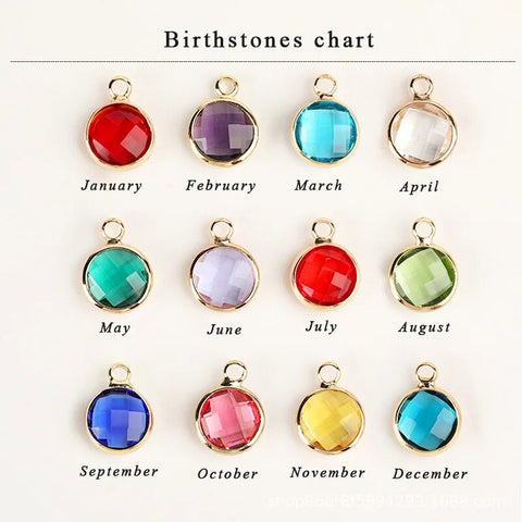 Collection of various birthstones, each representing a different month, arranged elegantly