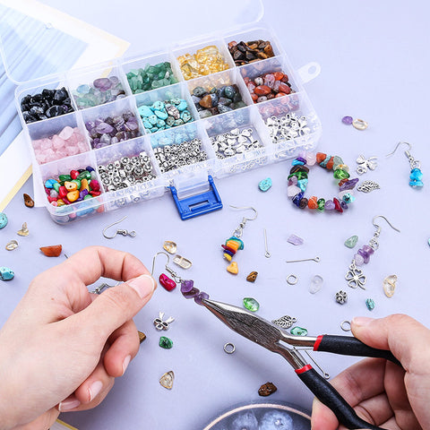 A starter jewelry crafting kit laid out on a workbench