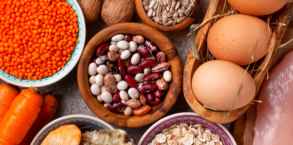 eggs, beans and other food on the table