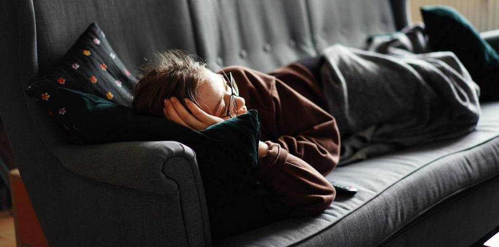 woman taking a nap to boost her stamina