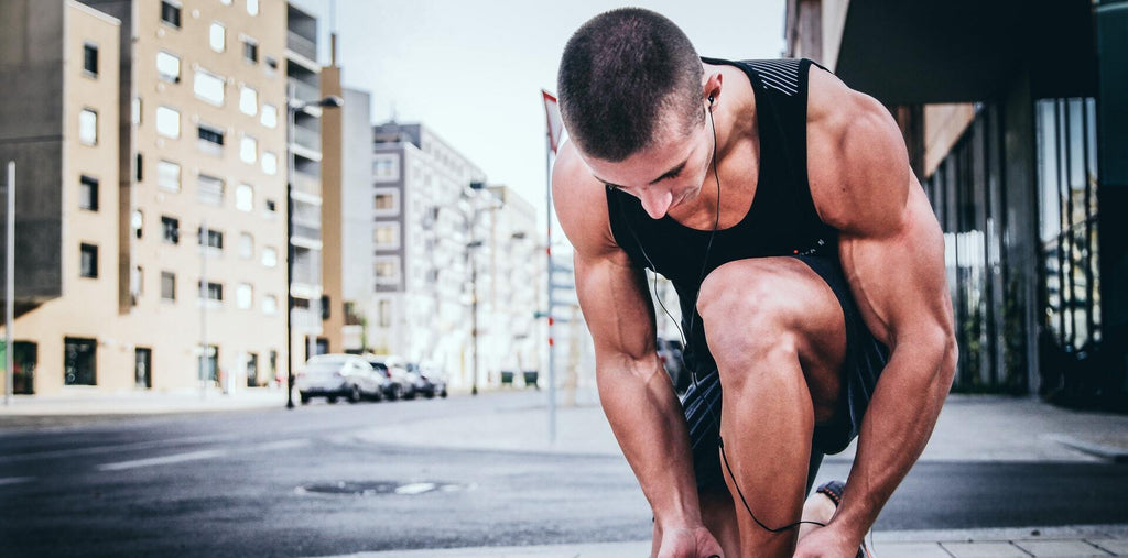 man exercising on the street to boost energy